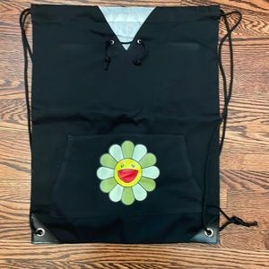 New backpack bag with drawstring closure. Fully plastic lined. Black.